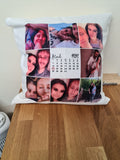 A plump white cushion that contains 9 squares. 8 of the squares are different photographs of a happy couple. The middle square displays a calendar of March 2021. The number 21 is circled in red on the calendar.