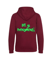 The back of a burgundy hoodie with neon green text that reads "It'll go everywhere!"